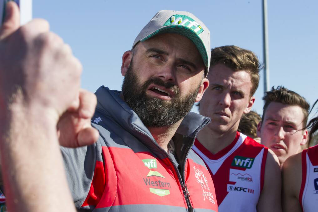 Shane Fisher addresses his troops. Picture: PETER PICKERING