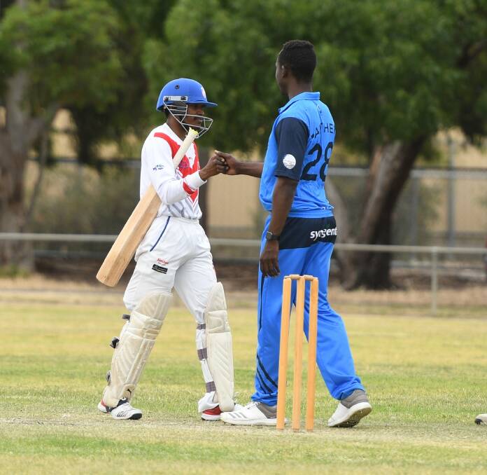 WELL PLAYED: Homers' Chaminda Gamage and Rup-Minyip's Mark Mbofana share a moment. Picture: RICHARD CRABTREE