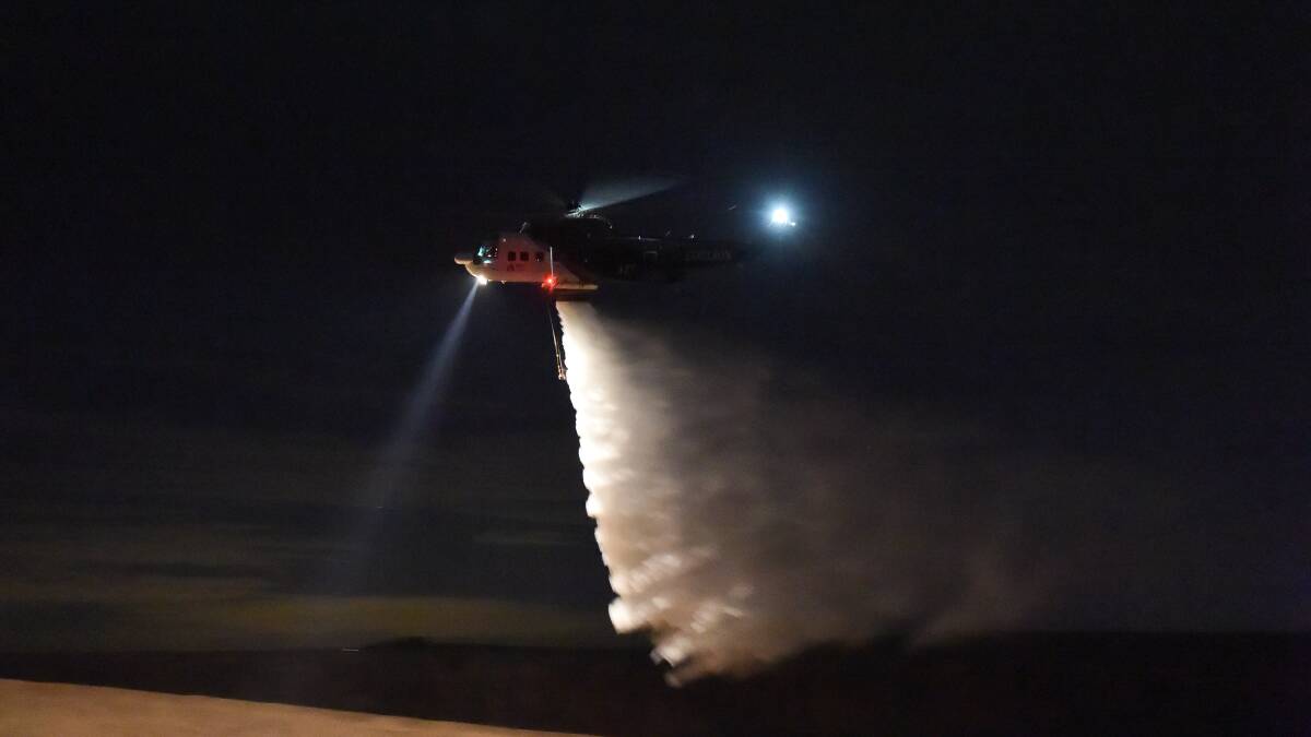 DROP: A water release during last summer's trial of night firefighting operations. Picture: Emergency Services Victoria