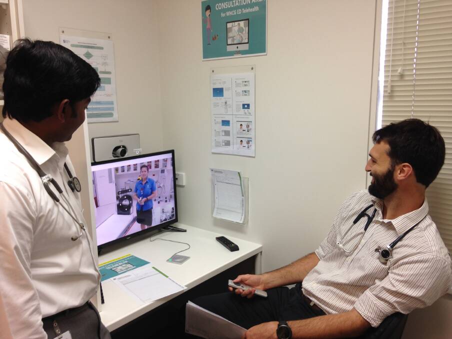 CONNECTED: Emergency Department registrars Ash Khan and Chris Pryke speak to nurse Nicole Schneider in Nhill through the telehealth system. Picture: CONTRIBUTED