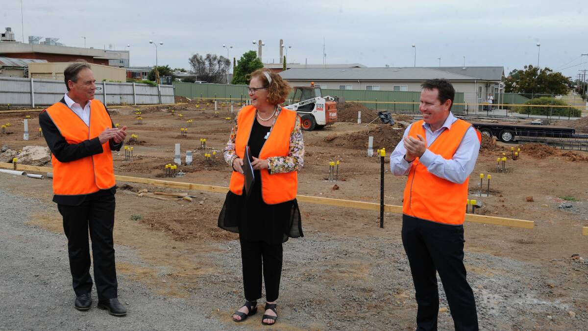 Health Minister Greg Hunt, Wimmera Health Care Group board chairwoman Marie Aitken and Member for Mallee Andrew Broad mark the start of the build in February. 