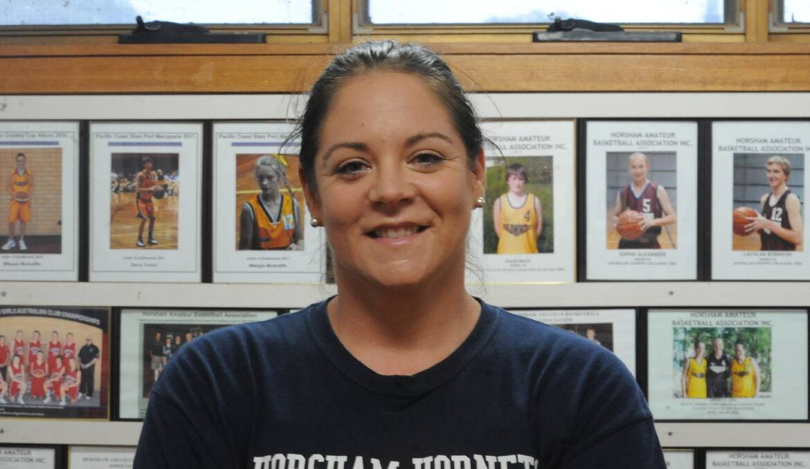 LEAD: Rebecca McIntyre has a new leadership role in basketball. 