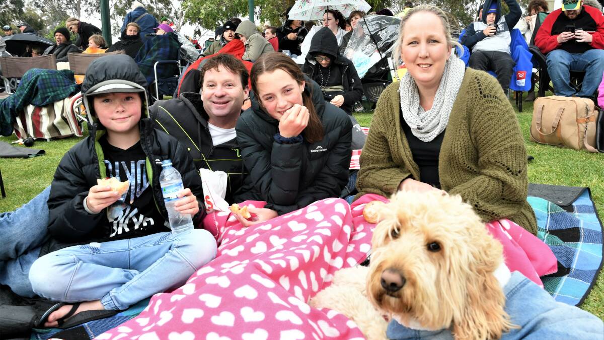 Jye, David, Mikayla and Jade Frizon of Horsham, with Monte the dog, were among the crowd at Horsham's Carols By Candlelight on Sunday. Picture: JADE BATE 