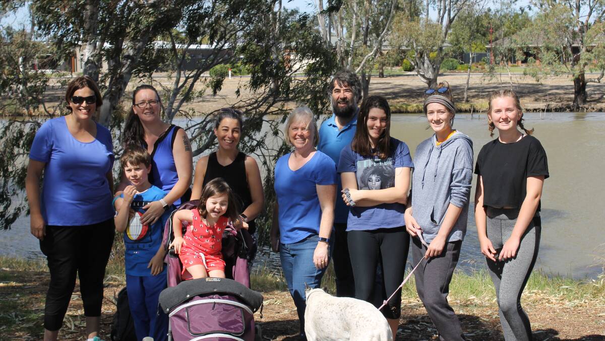 SUPPORT: Julie Dunmill, Rebecca Combe and son Josiah, Sarah Voisey and daughter Zariah, Vanessa Sonnberger, Bret Sonnberger, Astra Macumber, Sarah Hadzig and Rachel Kemp celebrate National Autism Awareness Day. 