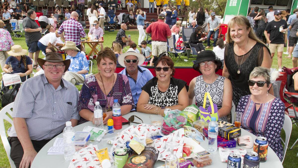 DAY OUT: Ron Lazones, Melanie and Shane Rickard, Nikki Nicholson, Carolyn Thomas, Suzy Vincent and Deanne Blachford at the Stawell Cup. Picture: PETER PICKERING