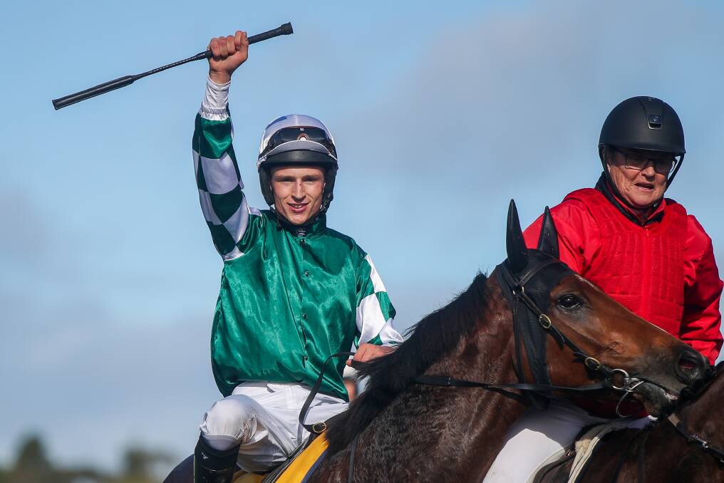 TOP RIDE: Jockey Will Gordon celebrates after guiding The Statesman to victory in the Sovereign Resort Galleywood Hurdle. Picture: Morgan Hancock