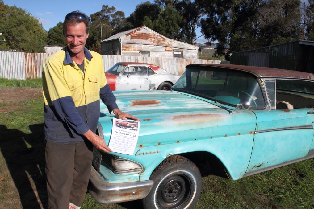 RARE: Greg Cook stands in front of an extremely rare 1958 Ford Edsel, believed to be only one of 20 in Australia. Picture: PETER PICKERING 
