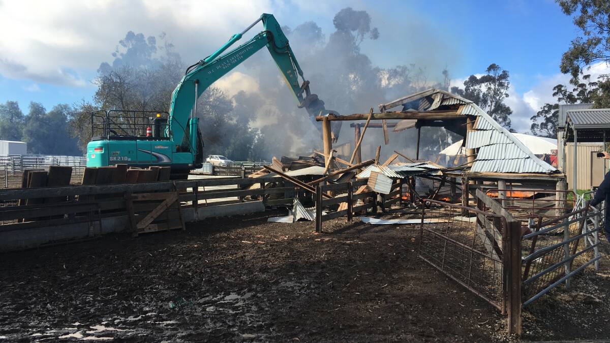 CHARRED RUBBLE: The aftermath of a wool shed near Marnoo which was destroyed by fire on Monday - sparked from an electrical fault. Picture: Country Fire Authority