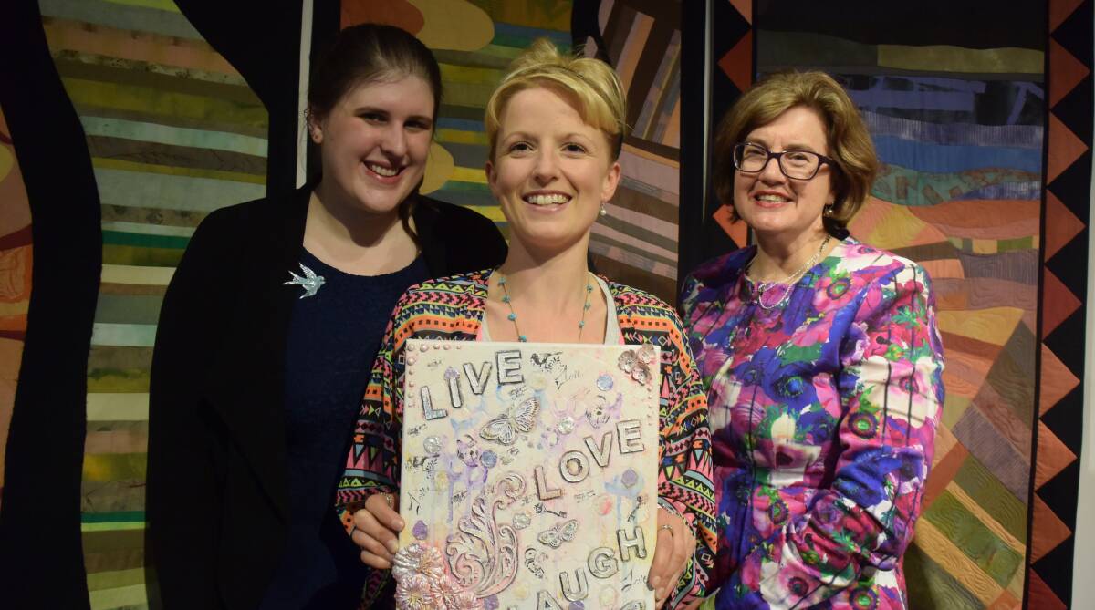 EXHIBIT: Wimmera Uniting Care mental health support worker Petra Hinch, Horsham artist Katie Waterfield and Uniting Care chief executive Wendy Sturgess.