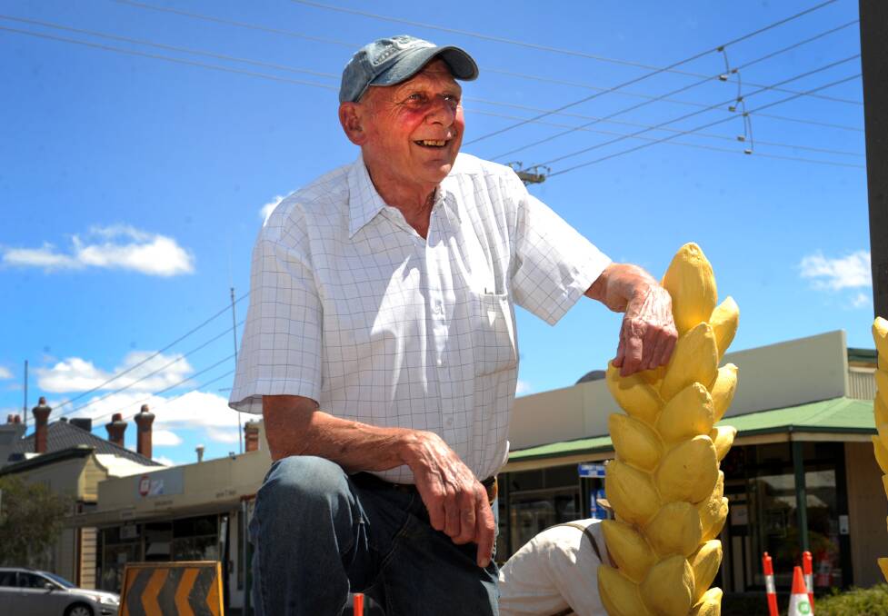 Minyip Progress Association president Peter Bridgland with one of the sculptures that forms the new streetscape in Minyip. Picture: OLIVIA PAGE