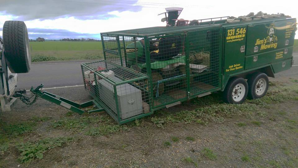 Horsham Jim's Mowing franchisee Paul Drendel's trailer sits beside the Wimmera Highway after rough conditions caused the draw bar to snap. Picture: CONTRIBUTED  