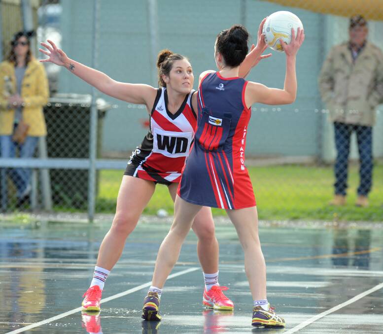 Liston playing for Laharum is guarded by Edenhope-Apsley's Krystal Schapel in 2016.