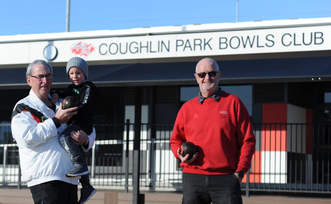 READY TO ROLL: Mick Ellis, his grandson and "the next generation of bowlers" Harrison Gray and Coughlin Park president Dennis Wade, socially distancing at Coughlin Park.