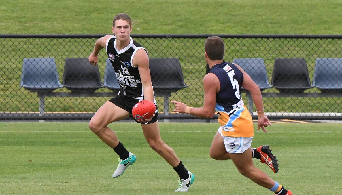 Tom Berry playing for the Greater Western Rebels against Bendigo earlier this year. Picture: LACHLAN BENCE