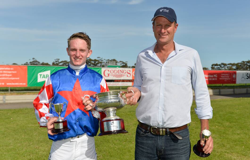 Jockey Michael Poy and trainer Paul Preusker after winning the Werribee Cup in 2019. Picture: RACING PHOTOS