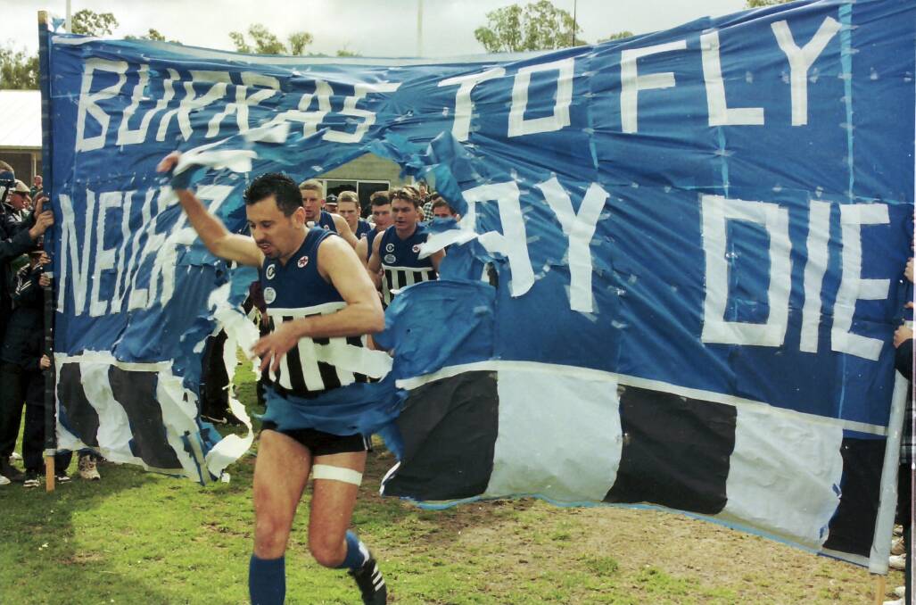 Bursting through the banner on grand final day 1996.