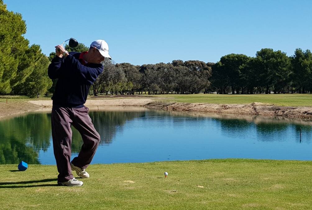 John Barton tees off a picturesque fifth tee at Nhill. Picture: RAE BOUND