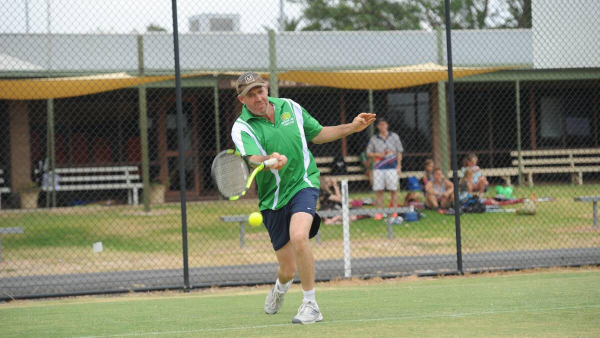 Horsham Lawn's Graeme Wood returns a forehand against Drung South at the weekend. Picture: SEAN WALES
