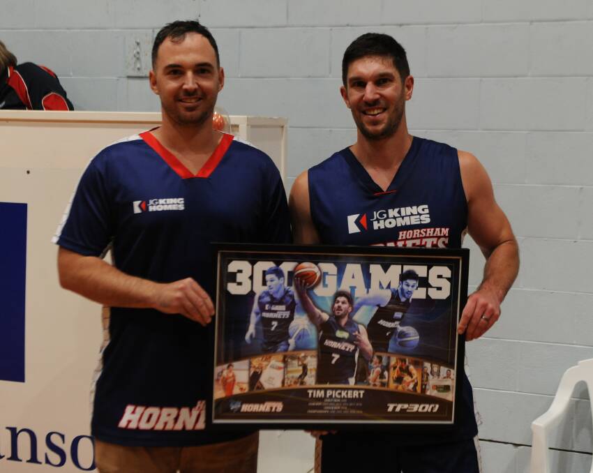 Cam Bruce and Tim Pickert, after Pickert's 300th game. Picture: RICHARD CRABTREE