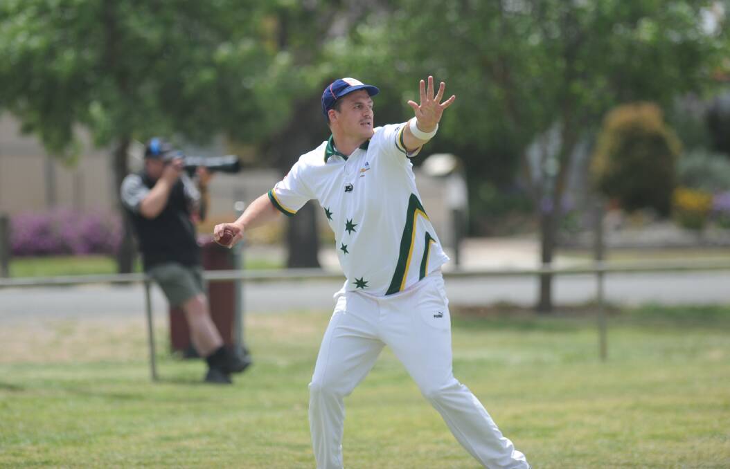 West Wimmera Warriors' Daniel Batson retrieves a ball in the outfield. The Warriors are still searching for their first win of the season.