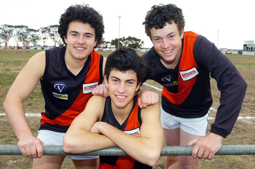 The Oakley brothers before their first game together in 2006. Adam, Troy and Shane.