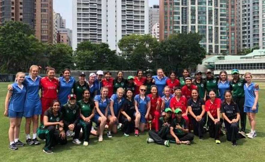 Last year's Cricket Without Borders team and the players from Hong Kong who they played against.