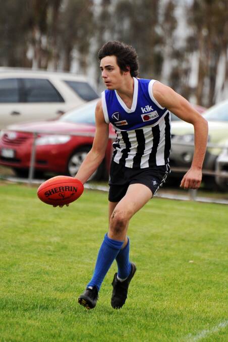 Delahunty gets a handball away for the Burras in 2009.