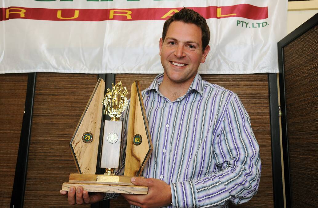 QUITE A RUN: Steve Schultz with the second of his three consecutive Horsham District league best and fairests in 2009. 