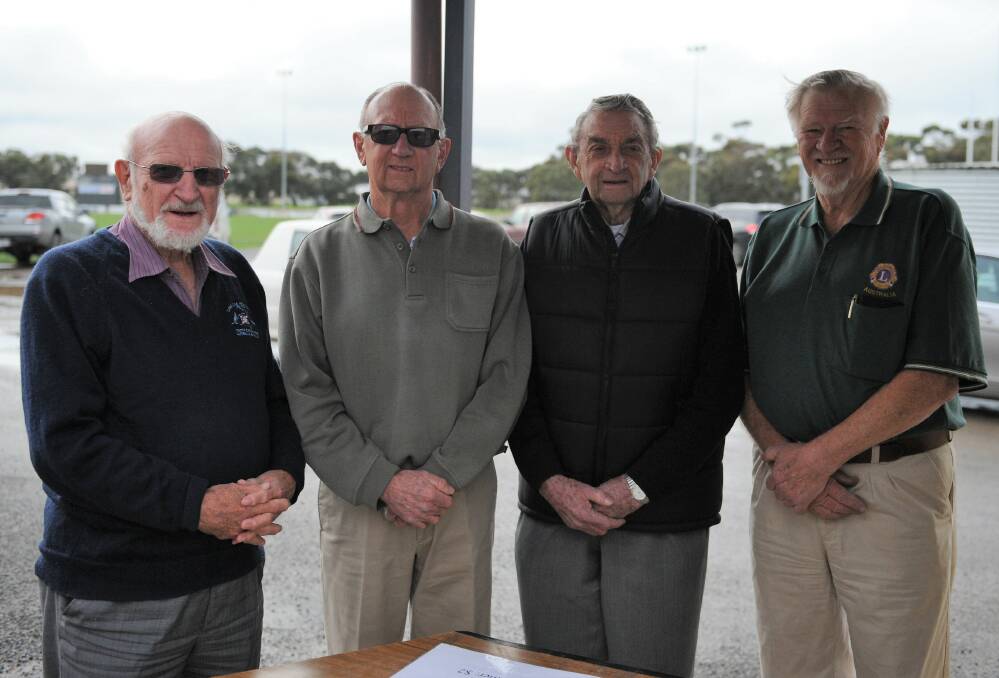 AT THE GATE: Alan Henderson, John Eldridge, Jim Quick and Phil Sheriff man the gate at Coughlin Park. There is a rotating cast of Lions club volunteers at the gate for every Horsham Saints home game. Picture: RICHARD CRABTREE