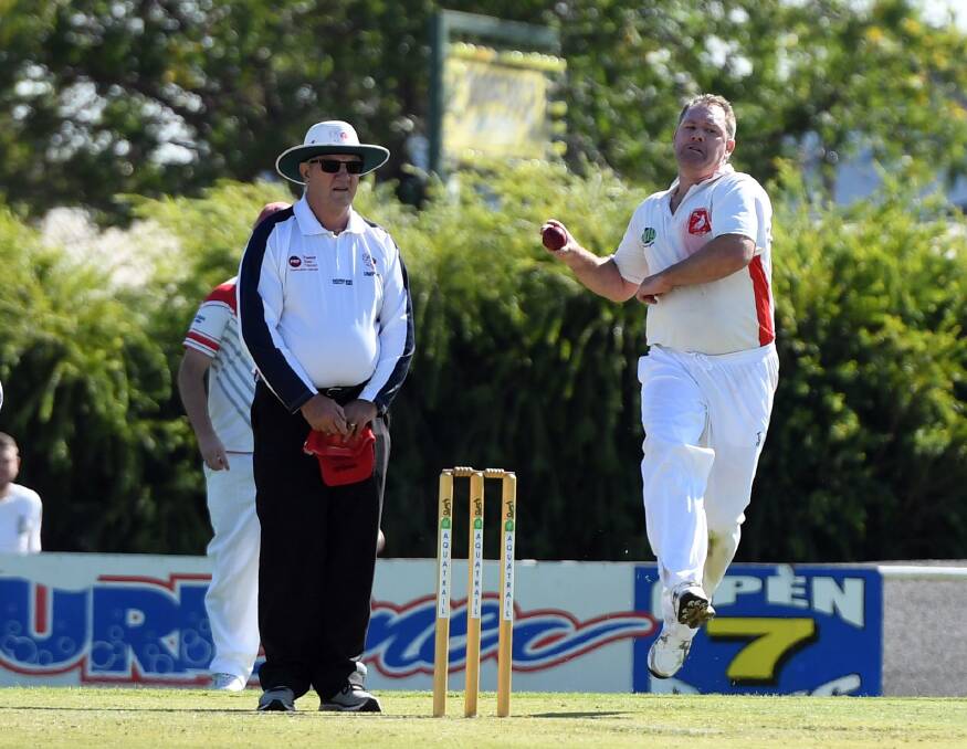 Umpire Tony Wills and Homers' Tim Hopper during the 2020 Horsham Cricket Association B Grade one day grand final. Picture: MATT CURRILL