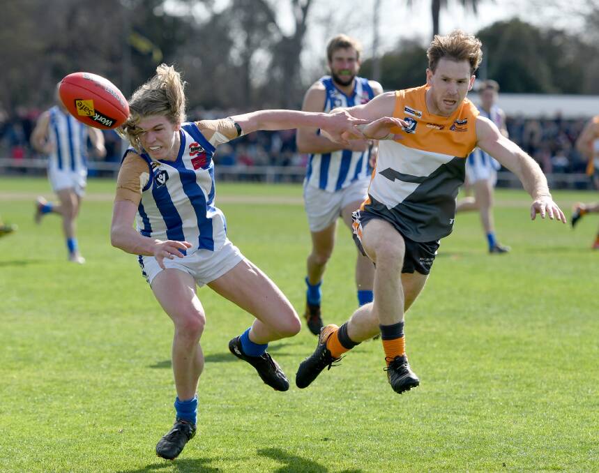 Jackson Fisher (right) competes for the ball in the 2017 Horsham District league grand final. 