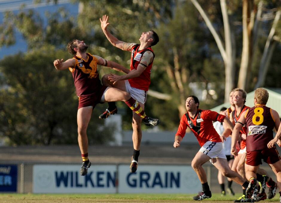 Jack Beaton, playing for the Stawell Warriors in 2017, flies high above his opponent.