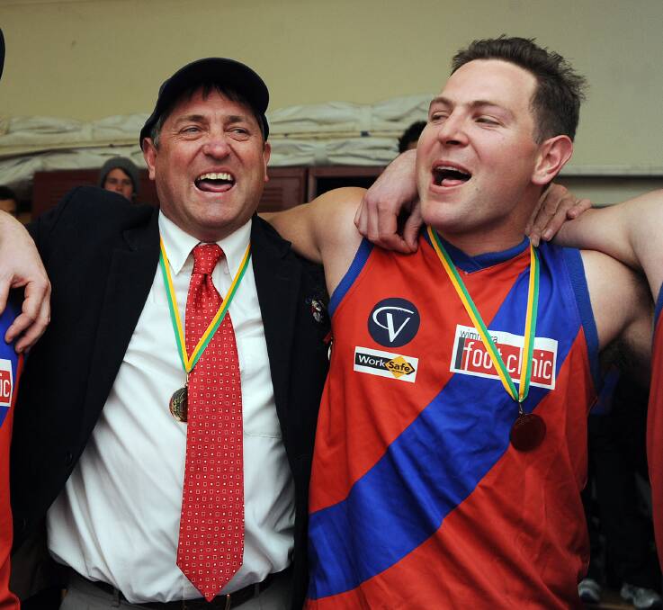 2007-2011 president Rod Lawson and Steve Schultz after the 2010 grand final.