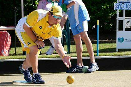 Josh Barry bowling for Australia.