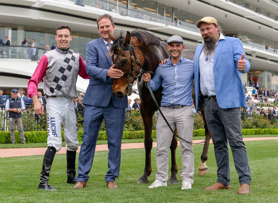 Jordan Childs and Paul Preusker with Surprise Baby (NZ) after winning the The Bart Cummings at Flemington Racecourse. Picture: Reg Ryan/Racing Photos