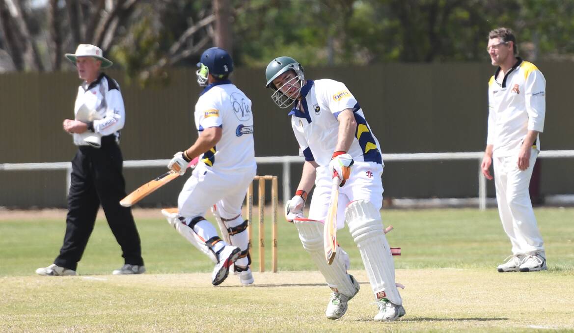 Dylan Arnott running between the wickets with ladder leading Colts.