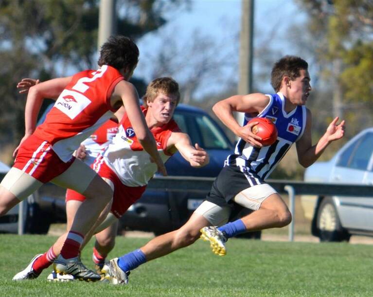 A young Petering bursts away with the Burras. Picture: CONTRIBUTED 