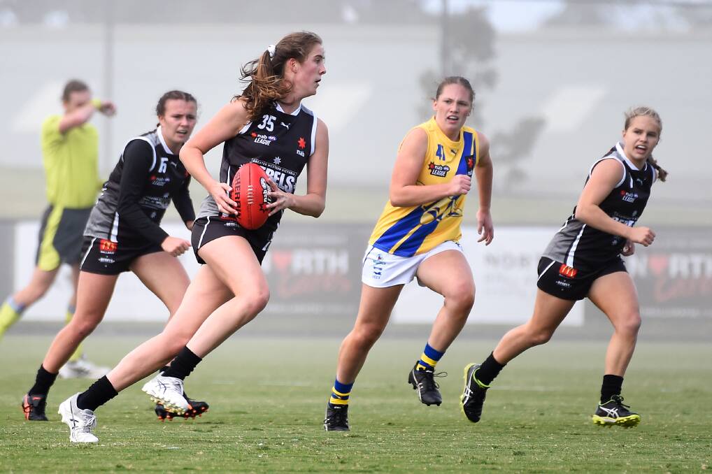 Maggie Caris in action in the NAB League. The Rebels managed two games before the season was cancelled in 2020. Caris was named in the best in both matches.