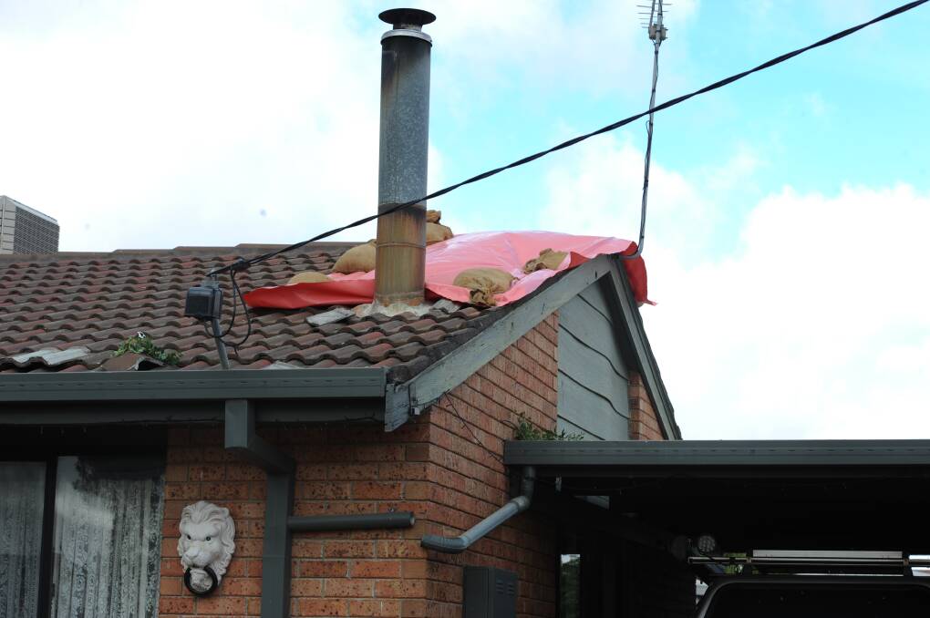 A roof in Horsham's north damaged by the tornado last Sunday night. Picture: RICHARD CRABTREE
