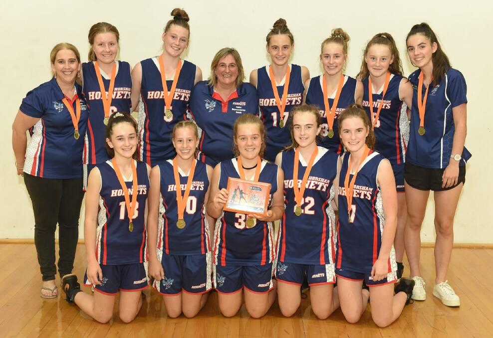 OUTSTANDING RESULT: The Horsham Hornets' under-16 girls celebrate a title in Bendigo. Picture: BAKSETBALL VICTORIA