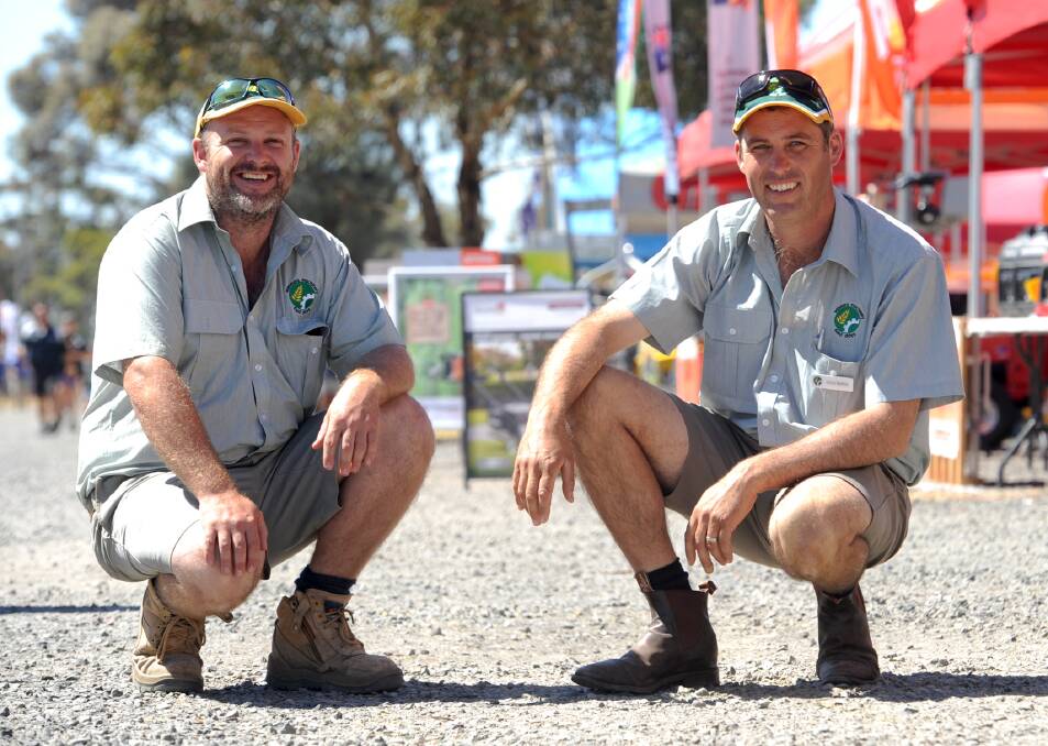 CHANGEOVER: Sam Eagle and outgoing president Chris Bartlett at a previous Field Days event. Picture: SAMANTHA CAMARRI