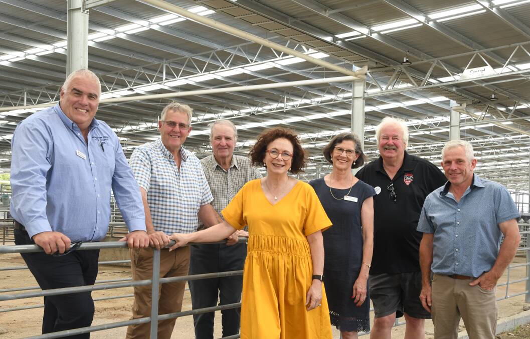 TURNOUT: Paul Christopher, David Grimble, Kevin Pymer, MP Anne Webster, HRCC mayor Robyn Gulline, Neville McIntyre and Ray Zippel under the new roof at the saleyards. Picture: RICHARD CRABTREE