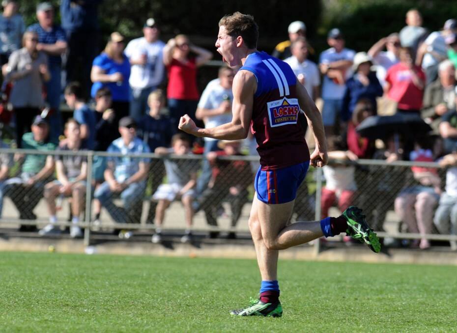 Jake Lloyd celebrates a goal with the Horsham Demons in the 2012 Wimmera Football League grand final. 