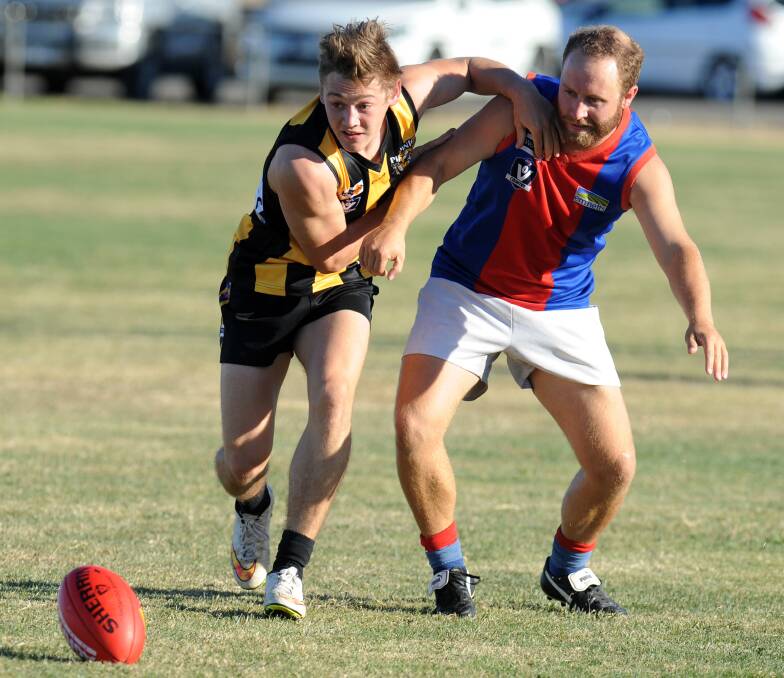 One of Kerri's sons, Ross Tickner (right) playing for Rupanyup.