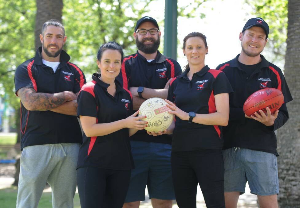 Noradjuha-Quantong football signings and netball coaches. Back, Damian Cameron, assistant coach Justin Chilver, Tom Magee. Front, assistant A and B grade coach Megan Byrne and head coach Fiona Rowe. Picture: RICHARD CRABTREE