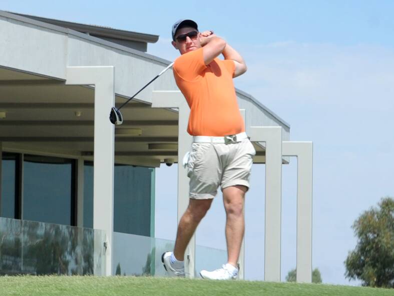 Nick Thomson tees off at the Horsham Golf Club.
