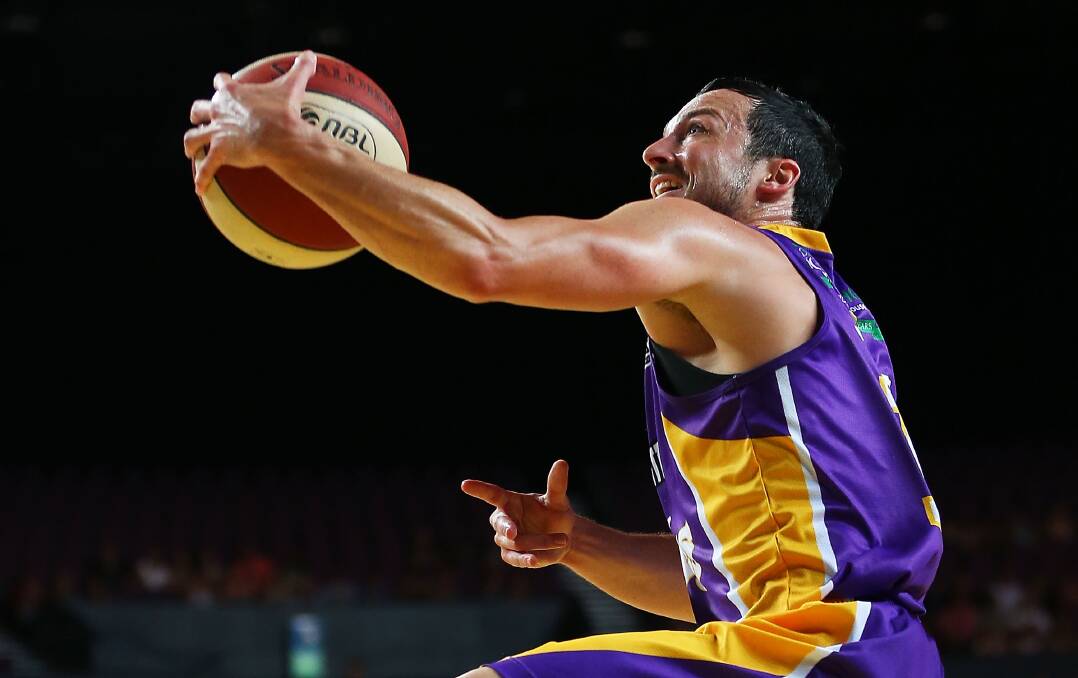 Aaron Bruce flies for a lay-up with the Sydney Kings in 2013. Bruce is one of only a few from the Horsham Basketball Association to play college basketball.