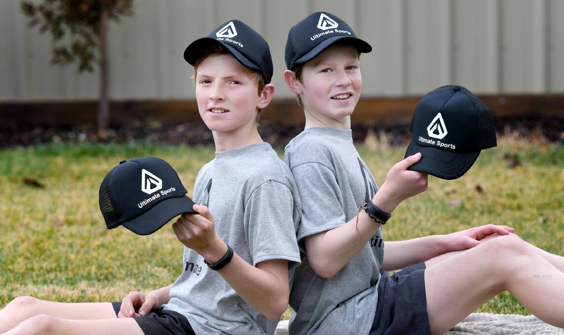 Connor and Lachlan with their Ultimate Sports apparel. Picture: SAMANTHA CAMARRI