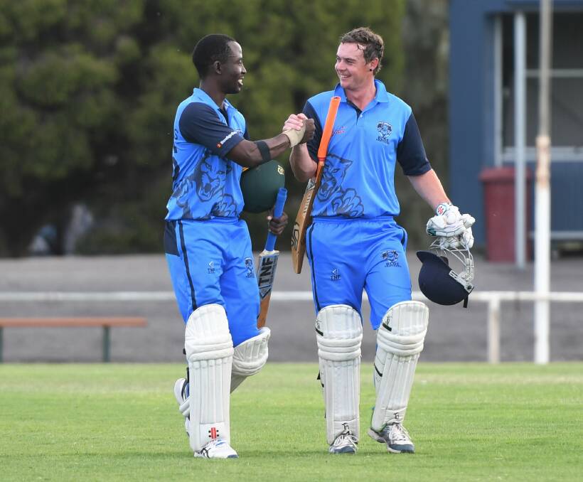 Mark Mbofana and Jamie Byrne walk off with a victory. Picture: MATT CURRILL