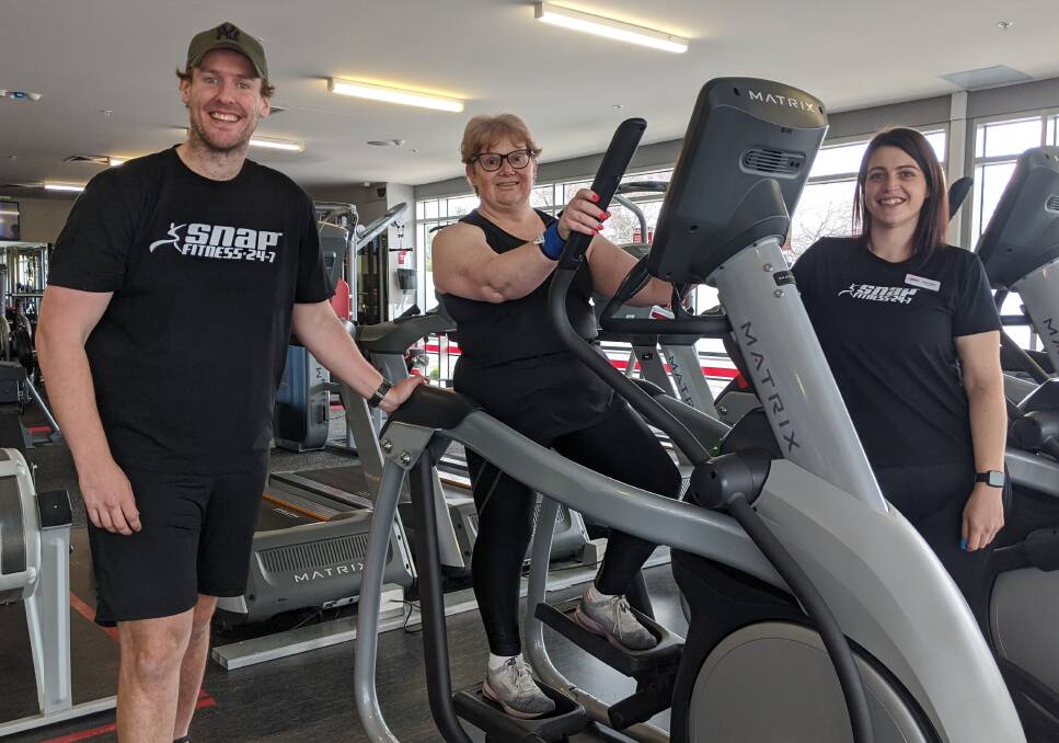 Personal trainer Jarrod Tickner, patron Lorelle Lewis and club manager Jacqui Monro at the reopened Snap Fitness Horsham on Monday. Picture: RICHARD CRABTREE